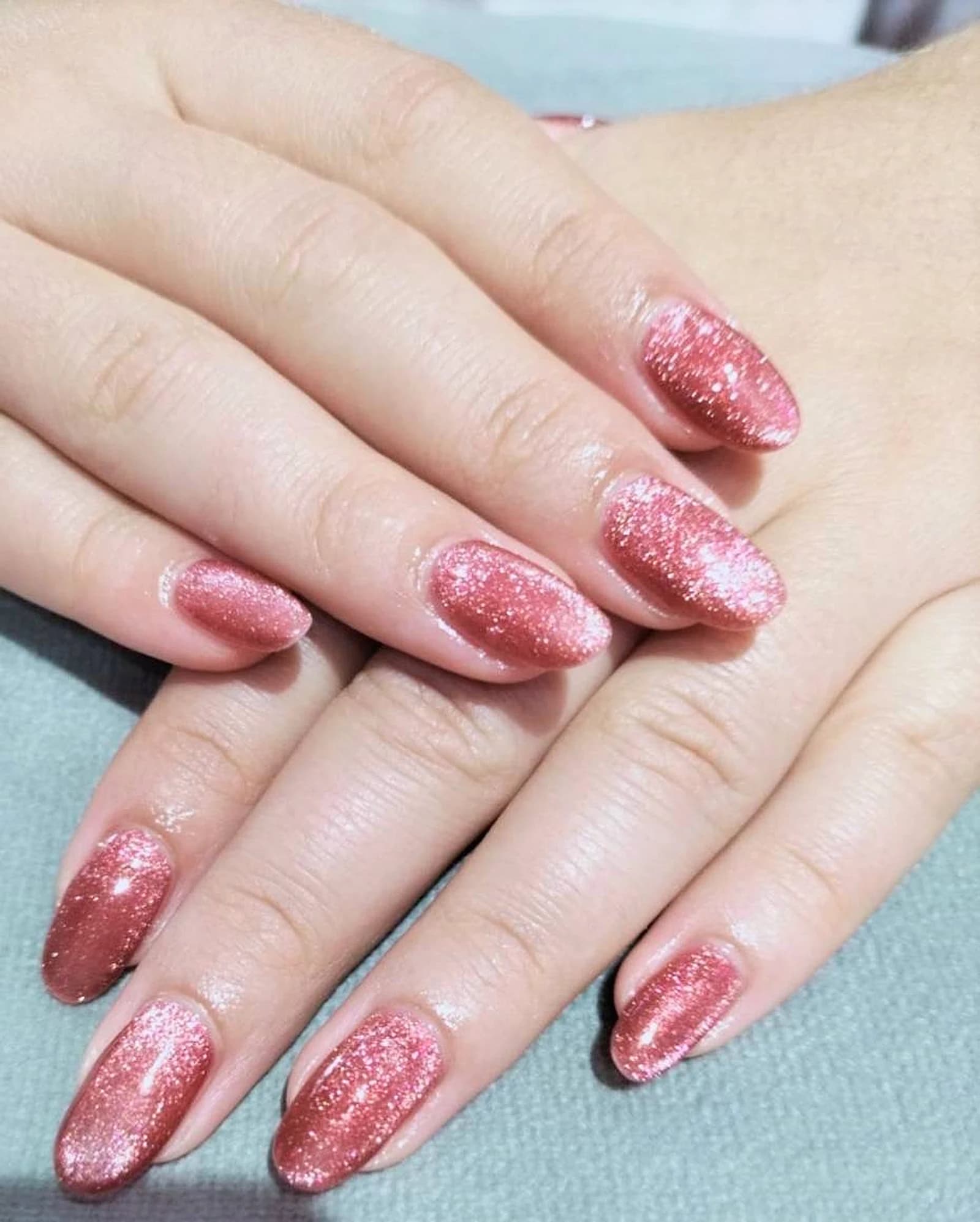 Pink glitter nails by Nail Kawaii Asoke